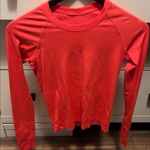 lululemon Swiftly waist length  in colour FLARE as shown in original Lulu add
